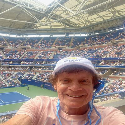 Marshall J. Hubsher at the US Open, witnessing the grandeur of the tennis tournament